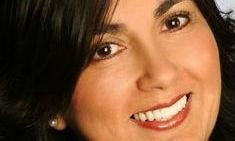 Complete-Smile-Makeover-with-Crowns-and-Veneers-After-Image